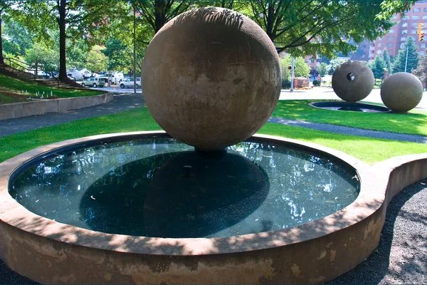 Stone sphere fountain in a park in Arlington, Virginia